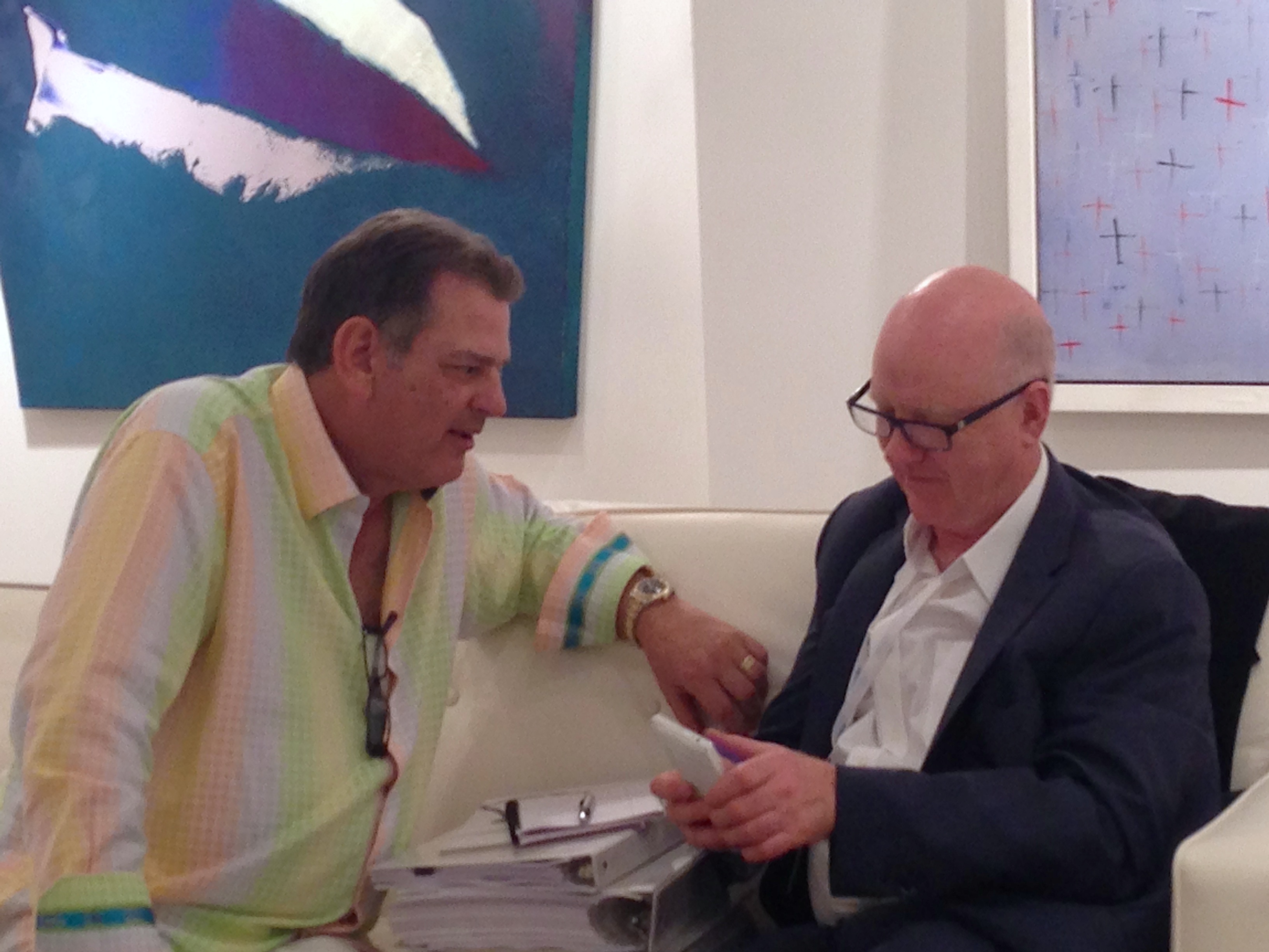 Ray Waterhouse discussing an acquisition with a client Ray Waterhouse discussing an acquisition with a client