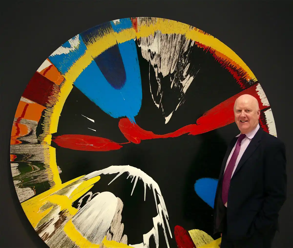 art advisor posing infront of art piece
