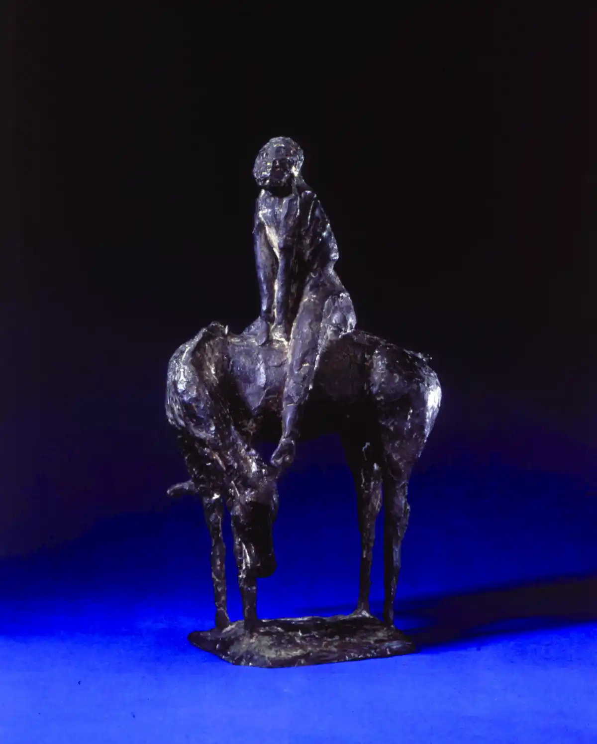 Piccolo Cavaliere a sculpture of a man on a horse